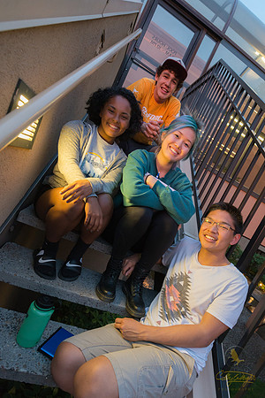 GeoFORCE students (clockwise from top) Justin Ferris, Cynthia Kim, Braden Miguel, and Angel Telfair pose on the stairs of a hotel in Portland, Oregon.