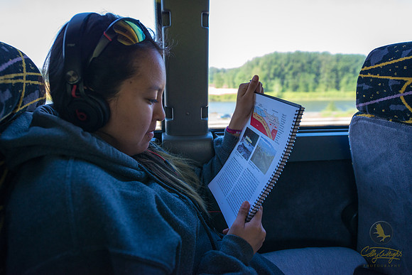 Frances (Ekaiyuk) Kagak looks over the daily reading while en route to the first stop of the day.